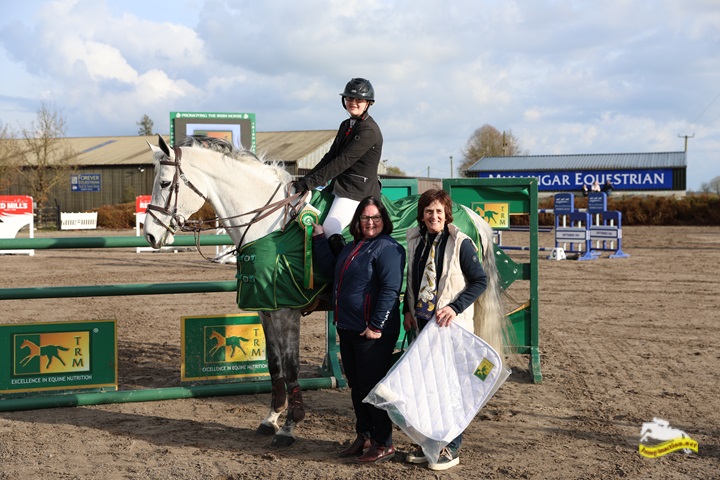 Read more about the article Katie Nallon Triumphs in the TRM®️ | SJC at Mullingar Equestrian Centre.